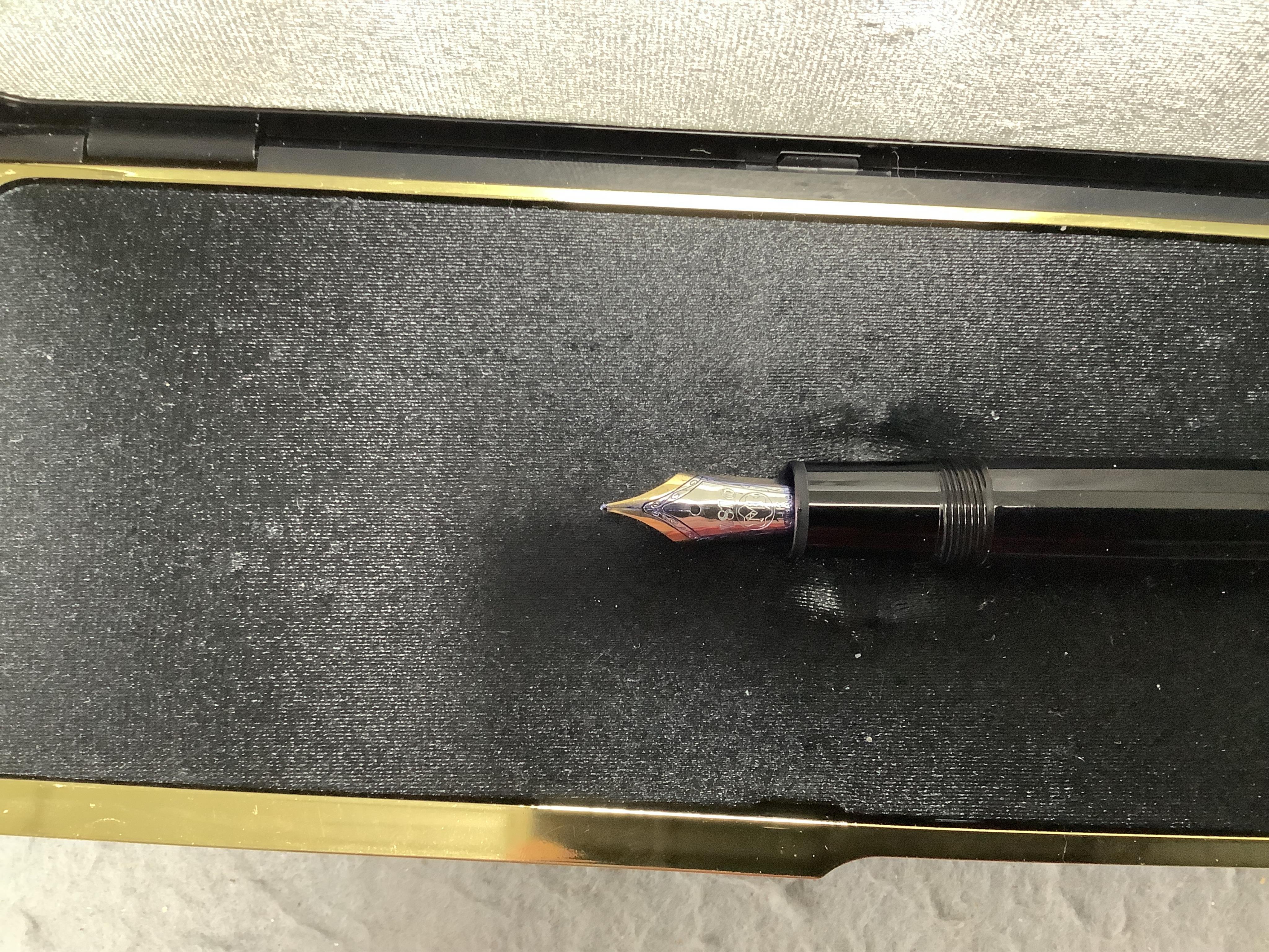 A Montblanc 146 vintage fountain pen, in original case, along with Aurora fountain pen and two others (4)